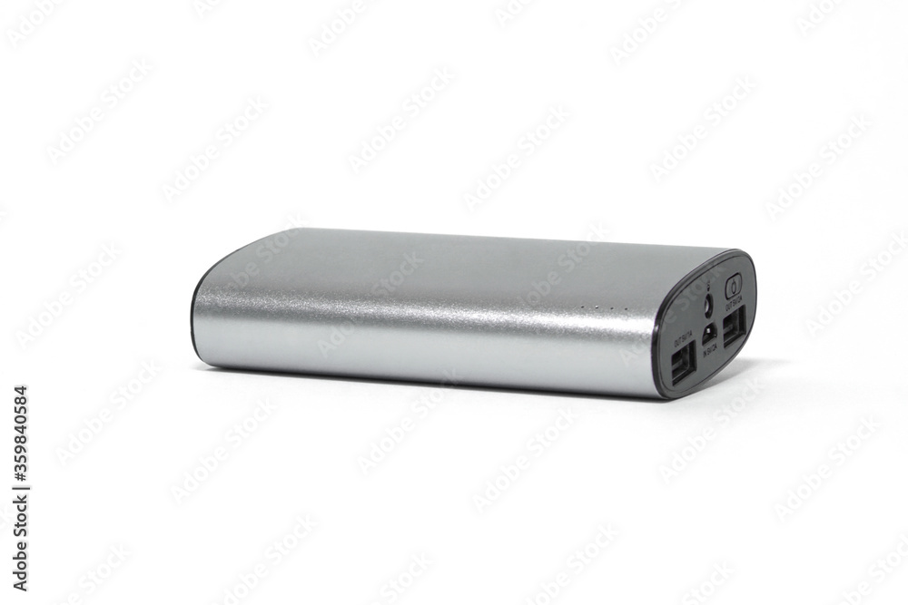 Grey power bank isolated on white background. Portable power bank for charging Grey power bank isolated on white background. Portable power bank for charging