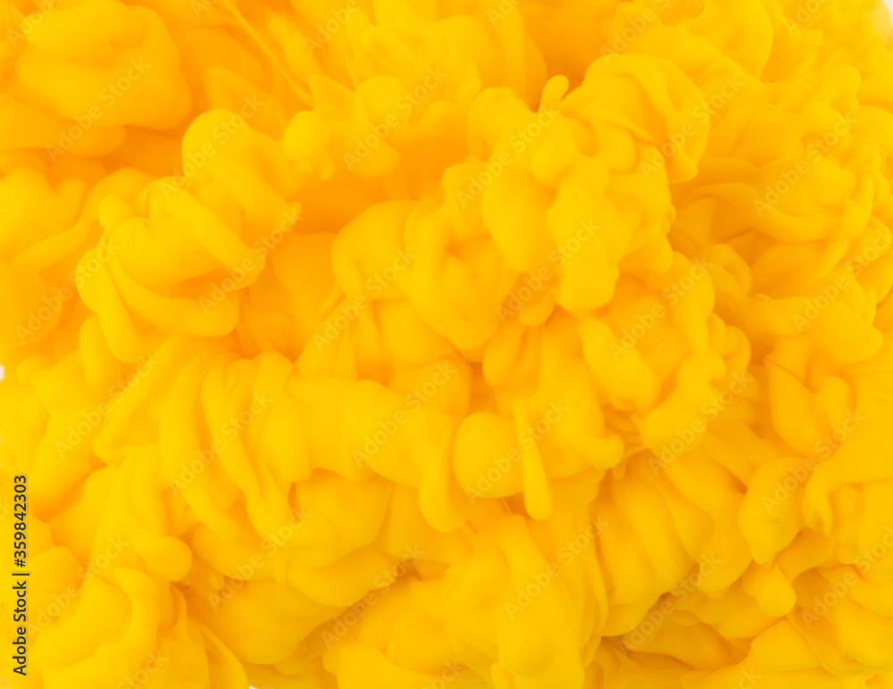 yellow Abstract acrylic paint color swirls in water isolated on white background yellow Abstract acrylic paint color swirls in water isolated on white background