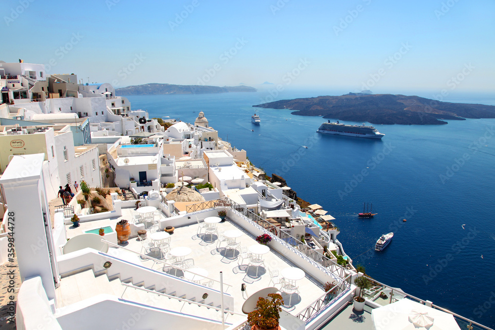 View of Fira town at the top of a cliff in Santorini, Greece.
