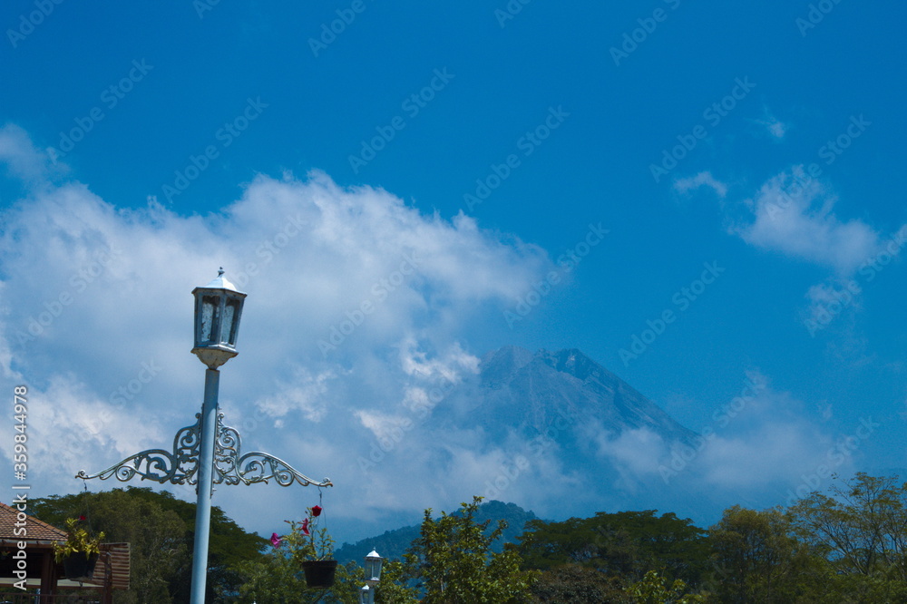 lamp post against blue sky