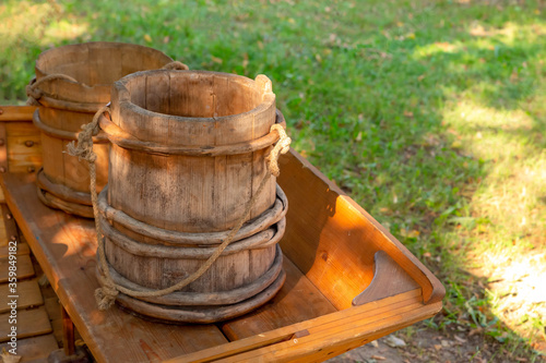 wooden bucket old and weathered, traditional container for storing water