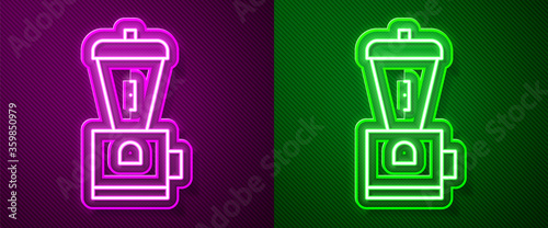 Glowing neon line Electric coffee grinder icon isolated on purple and green background. Vector Illustration.