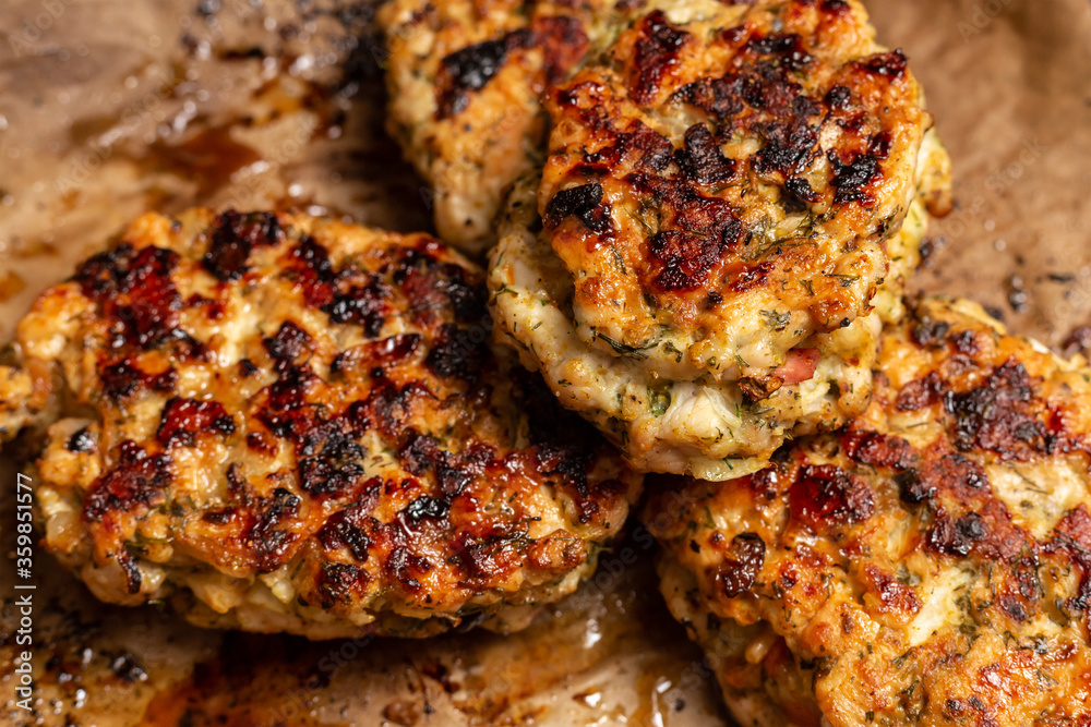 seasoned and tasty meat patties stacked in a stack closeup