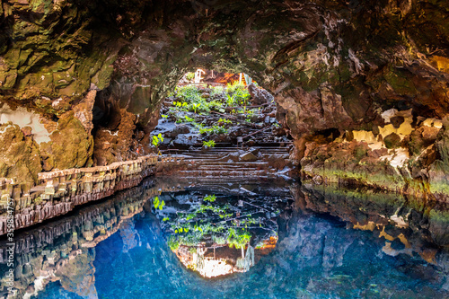 Cave Jameos del Agua, natural cave and pool created by the eruption of the Monte Corona volcano in Lanzarote, Canary Islands, Spain photo