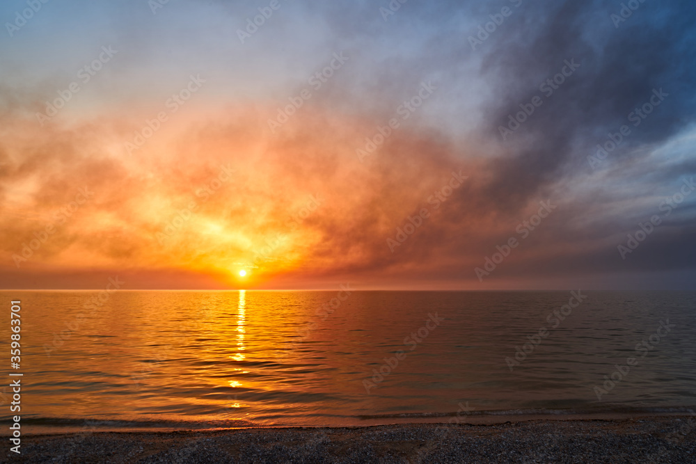 Sea sunset. Smoke wildfires sweeping across the sky. Sea sunset. Smoke wildfires sweeping across the sky.