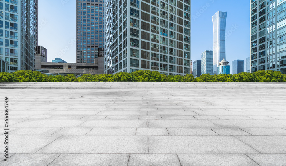 Fototapeta premium Empty city square road and modern business district office buildings in Beijing, China