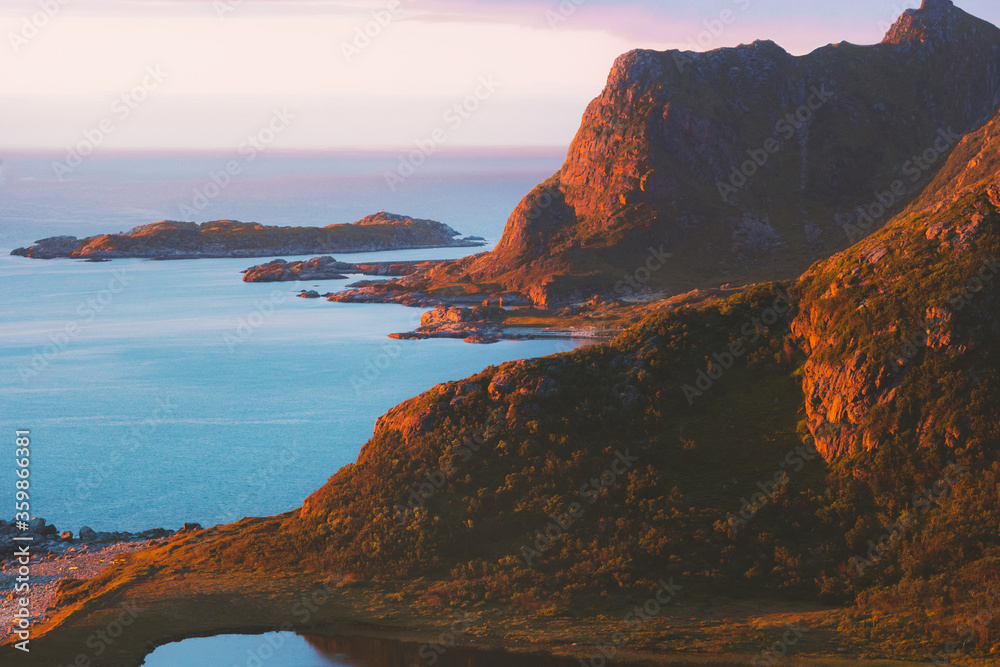 Sunset mountains and ocean landscape in northern Norway travel Vesteralen islands scenic aerial view