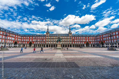 Madrid Mayor plaza with few blurred tourists photo