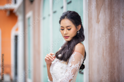 young woman in a wedding dress © FotoArtist