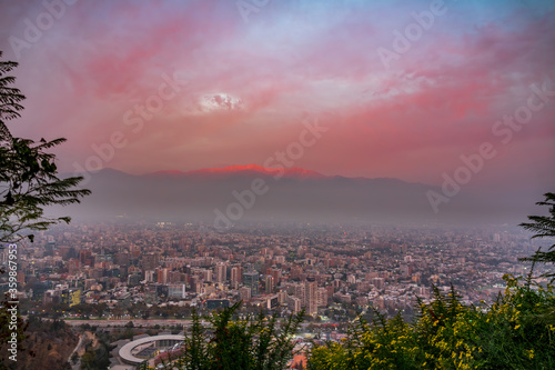 Santiago de Chile city at dusk with Andes