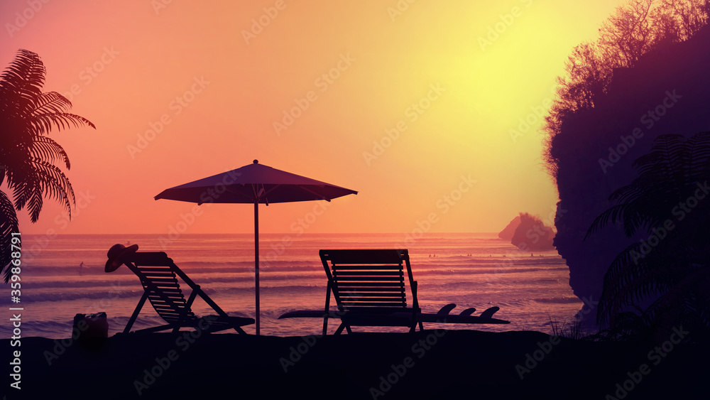 Tropical resort beach under the setting sun's rays.