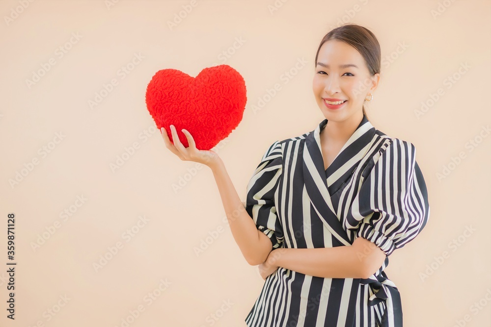 Portrait beautiful young asian woman with heart pillow Portrait beautiful young asian woman with heart pillow