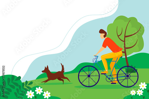 Cyclist-an athlete on a Bicycle. Man rides a Bicycle in the Park with the dog. Summer landscape with trees and flowers.