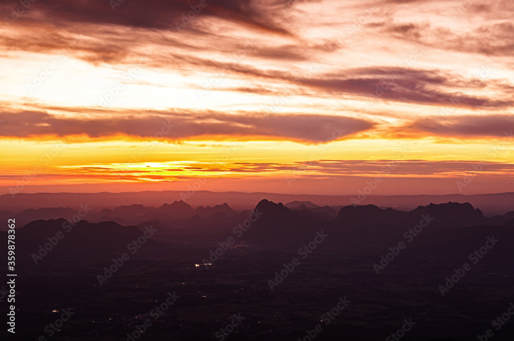 Beautiful Asian limestone mountain landscape sunrise at Pha Nok An cliff in Phu Kradueng National park. Loei - Thailand