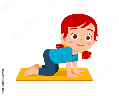 happy cute little kid boy and girl do yoga pose