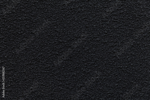 Black cement wall texture and seamless background. Dark wall with copy space. © torsakarin