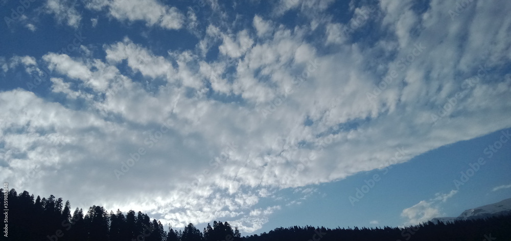 time lapse clouds over the mountains