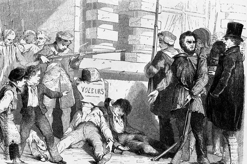 Revolution of 1830. France. Punishment that the people give to thieves.Antique illustration. 1856. photo