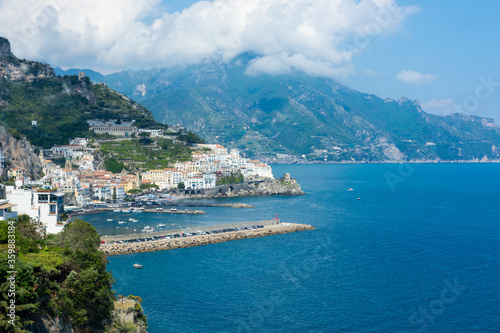 Panoramic view of beautiful Amalfi on hills leading down to coast, Campania, Italy. Amalfi coast is most popular travel and holiday destination.