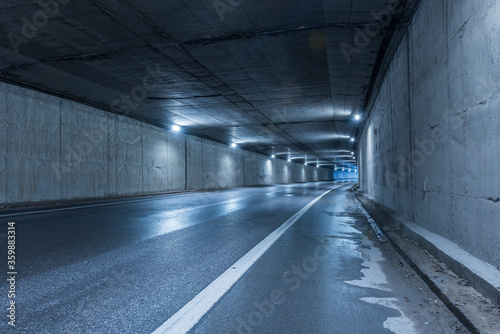 Fototapeta Naklejka Na Ścianę i Meble -  Highway tunnel. Interior of an urban tunnel without traffic.