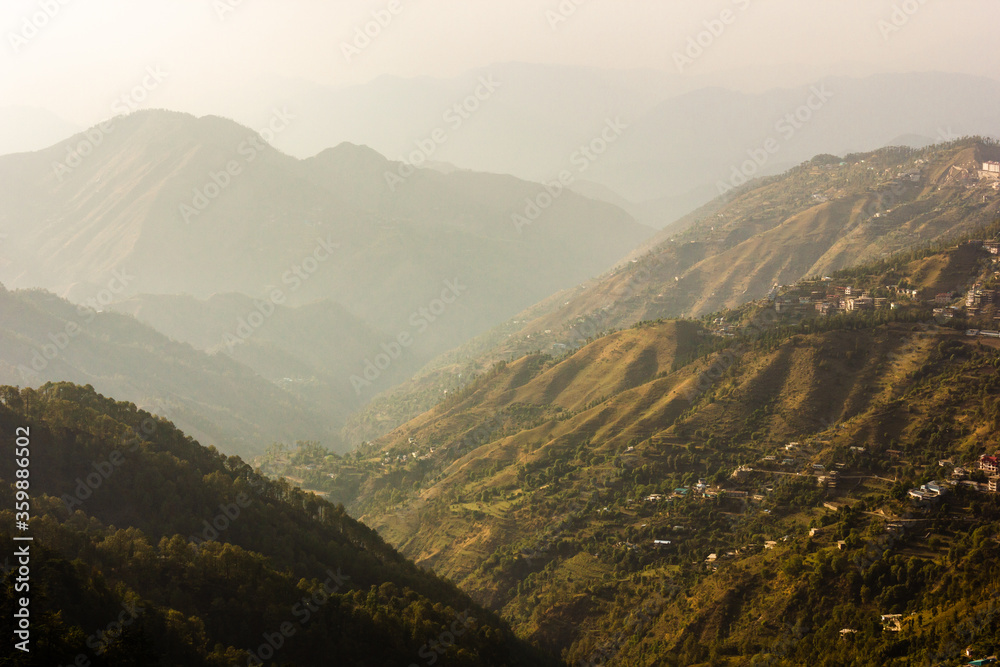 Cascading green hills in the Himalayan town of Shimla