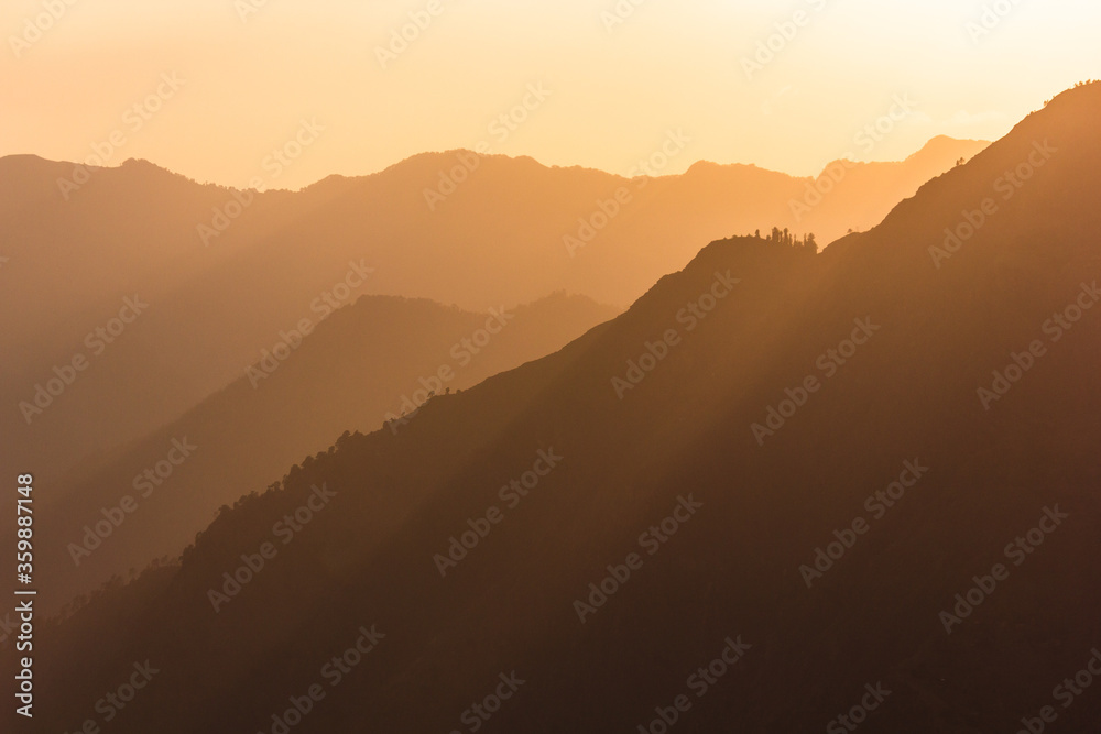 Evenigh light hitting Himalayan mountain silhouettes in Sarahan