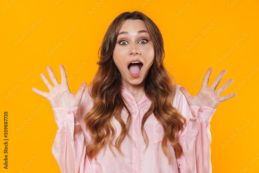 Image of beautiful excited woman expressing surprise on camera Image of beautiful excited woman expressing surprise on camera