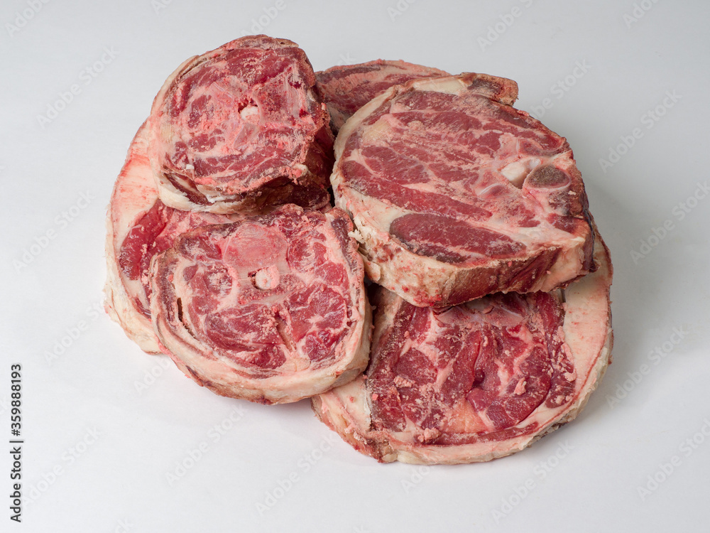 Obraz premium Slices of fresh raw mutton meat. Parts of the neck. Ingredients for cooking