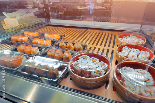 japanese food in plastic box display in refigurator for sale at supermarket