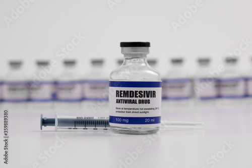 Remdesivir antiviral injectable drug vaccine medicine vial Covid-19 Corona Virus 2019-ncov syringe injection. Vaccination, immunization, treatment to cure Covid 19 Corona Virus disease Medical concept