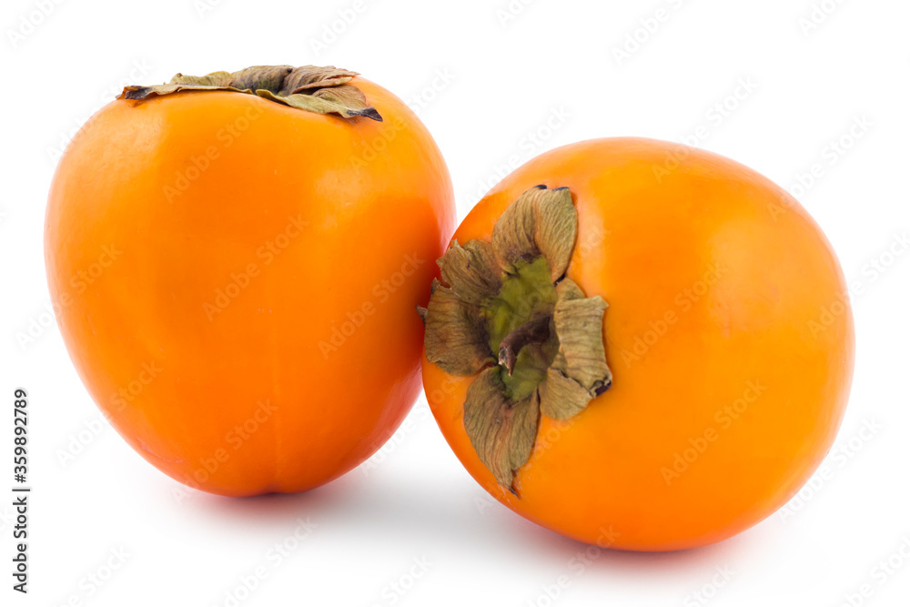 Two fresh ripe persimmon fruit isolated on white background Two fresh ripe persimmon fruit isolated on white background