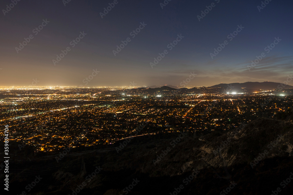 Night mountaintop view of Pasadena, Glendale and downtown Los Angeles, California.