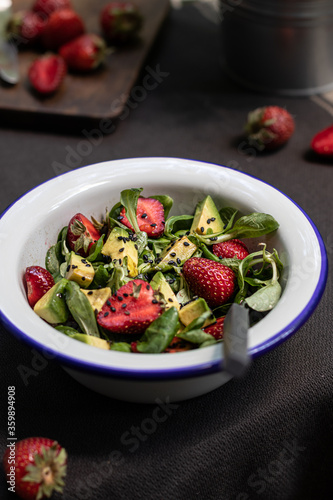 Summer salad with avocado and strawberry 