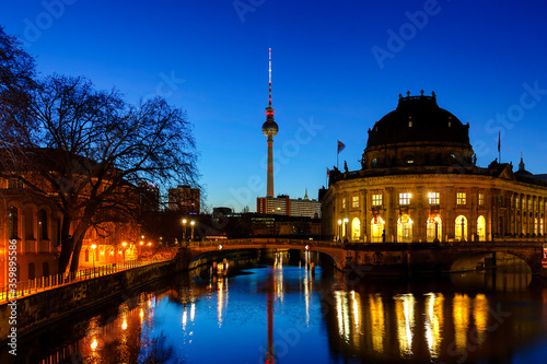 Berlin night cityscape view with television tower and spree river