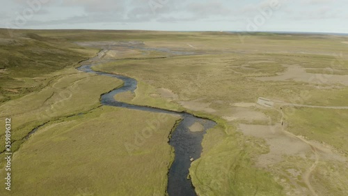 Aerial View, River, Green Landscape, Rif, Iceland, Flying Downwards And Orbit To The Right (Camera Movement) photo