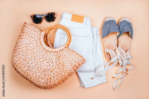 Summer fashion flatlay with t-shirt and sunglasses