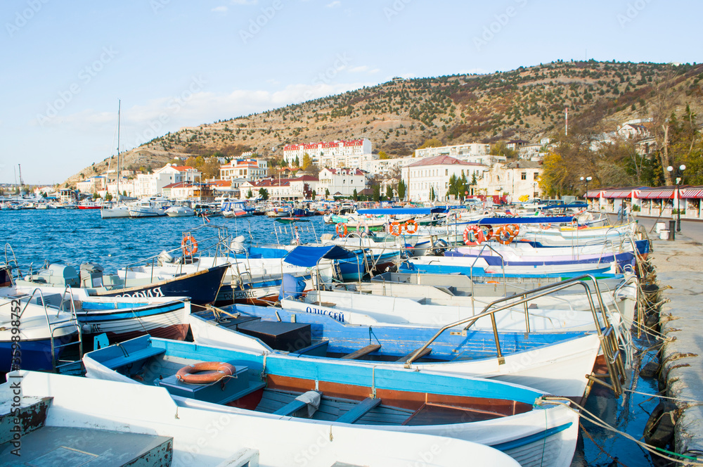 Balaklava, Crimea - November, 6, 2019 Many boats in tiny harbor of Balaklava