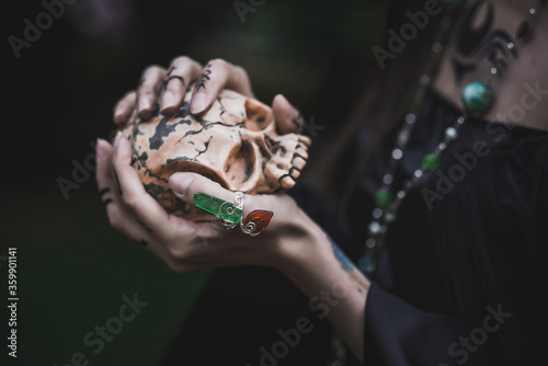 girl in a gothic gloomy image in a lilac