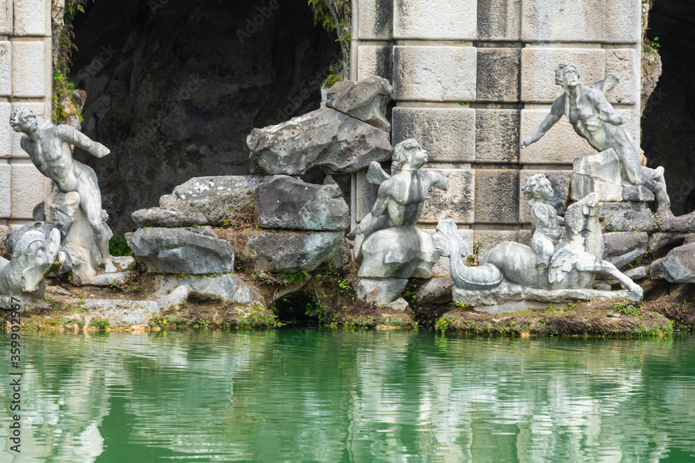Baroque fountain with statues in the gardens of the Caserta royal palace, Italy.