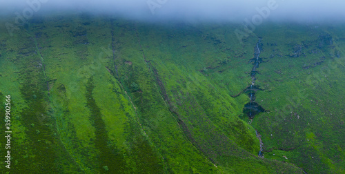 Aerial view of the spring landscape of rocks and grasslands in the Estacas de Trueba. Vega de Pas  Valles Pasiegos  Cantabria  Spain  Europe