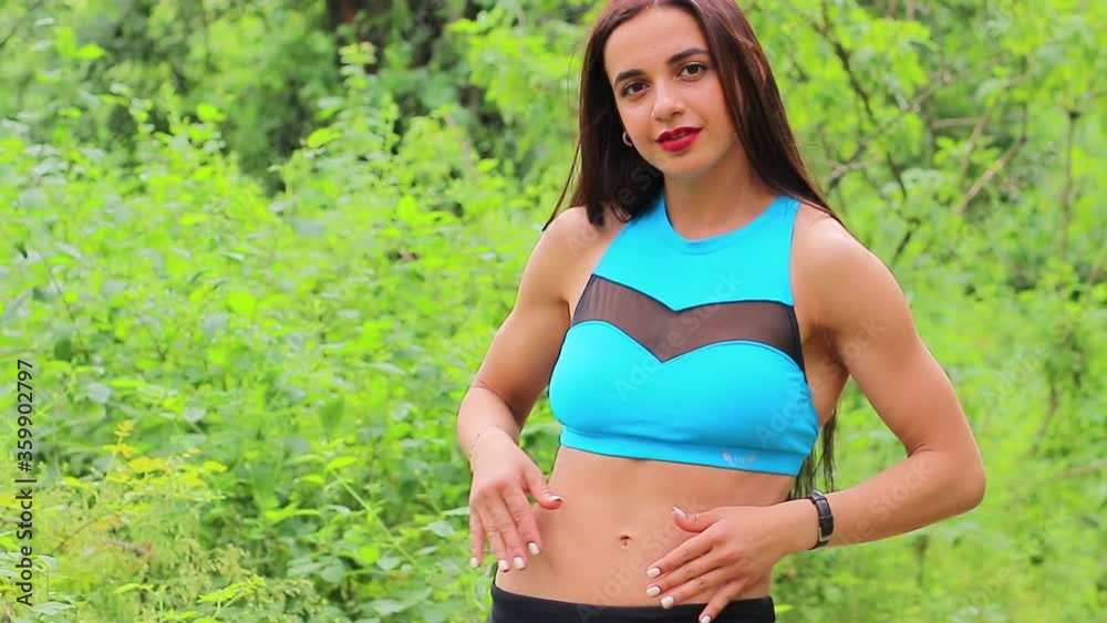 athletic girl with white skin and dark hair in a beautiful place in nature athletic girl with white skin and dark hair in a beautiful place in nature
