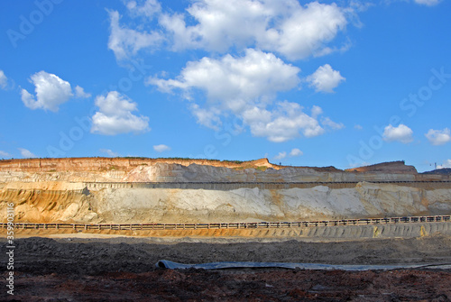 Conveyor belt on surface mine. Beautiful landscape of a surface mine.