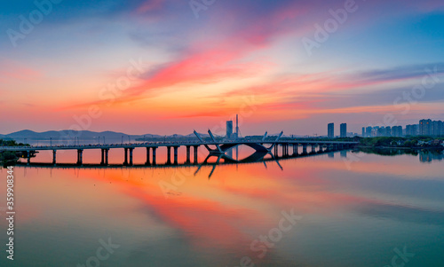 Dusk scenery of Li Lake bridge, Wuxi City, Jiangsu Province, China © Weiming