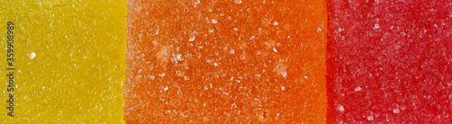 Sweet marmalade of three colors. Close-up.