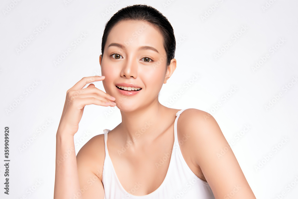 Beautiful Young asian Woman touching her clean face with fresh Healthy Skin, isolated on white background, Beauty Cosmetics and Facial treatment Concept Beautiful Young asian Woman touching her clean face with fresh Healthy Skin, isolated on white background, Beauty Cosmetics and Facial treatment Concept