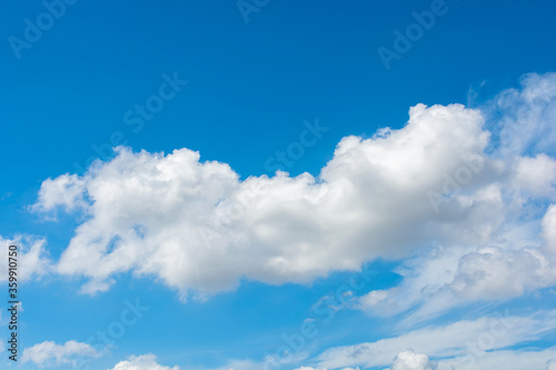 Fototapeta Naklejka Na Ścianę i Meble -  Cirrus and cumulus clouds on blue sky background.