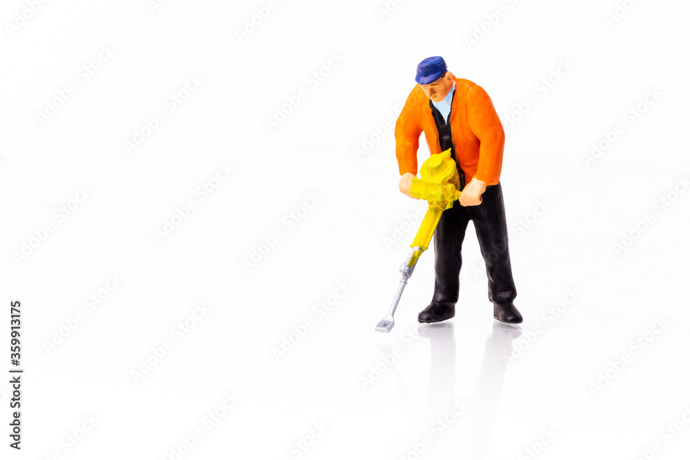 Miniature Builder worker with pneumatic hammer drill Miniature Builder worker with pneumatic hammer drill