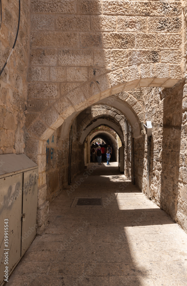 Fototapeta premium Old buildings on Al-Hakkari Street in the Arab Quarter in the old city of Jerusalem, Israel
