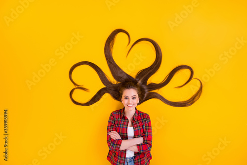 Top view above high angle flat lay flatlay lie concept of nice funky cheerful long-haired girl heart composition curls hairdo folded arms isolated on bright vivid shine vibrant yellow color background