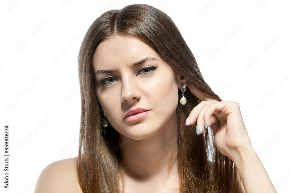 slender girl in overalls. Sports girl in tight clothes. Athletic brunette on a white background slender girl in overalls. Sports girl in tight clothes. Athletic brunette on a white background